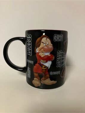 Disney Black Mug Featuring Grumpy Character with Red Outfit